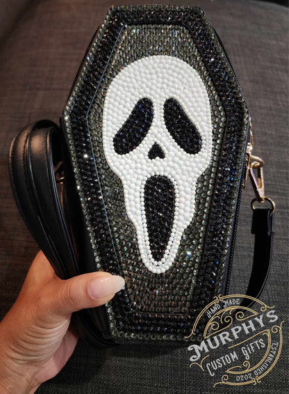 CRYSTAL COVERED SCREAM GLOW COFFIN HALLOWEEN PURSE